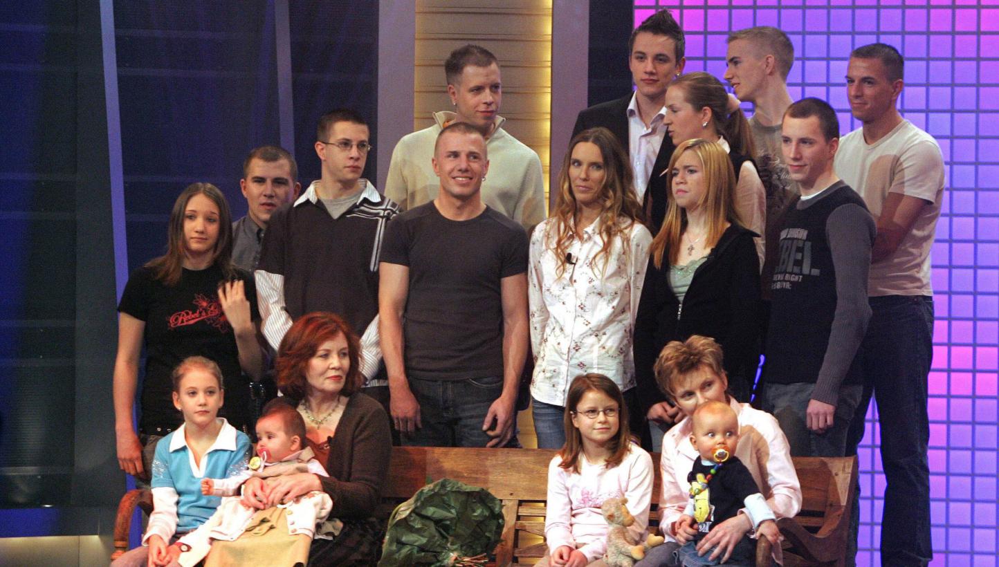 Annegret Raunigk (second from left in the first row), then 55, with her youngest daughter Lelia (on her knees) and other children and grandchildren as a guest on a German channel RTL show in Cologne in December 2005. -- PHOTO: AFP&nbsp;