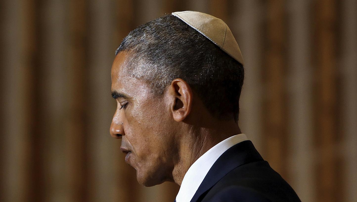 US President Barack Obama wears a traditional head covering as he delivers remarks on Jewish American History Month at the Adas Israel Congregation synagogue in Washington May 22, 2015. -- PHOTO: REUTERS