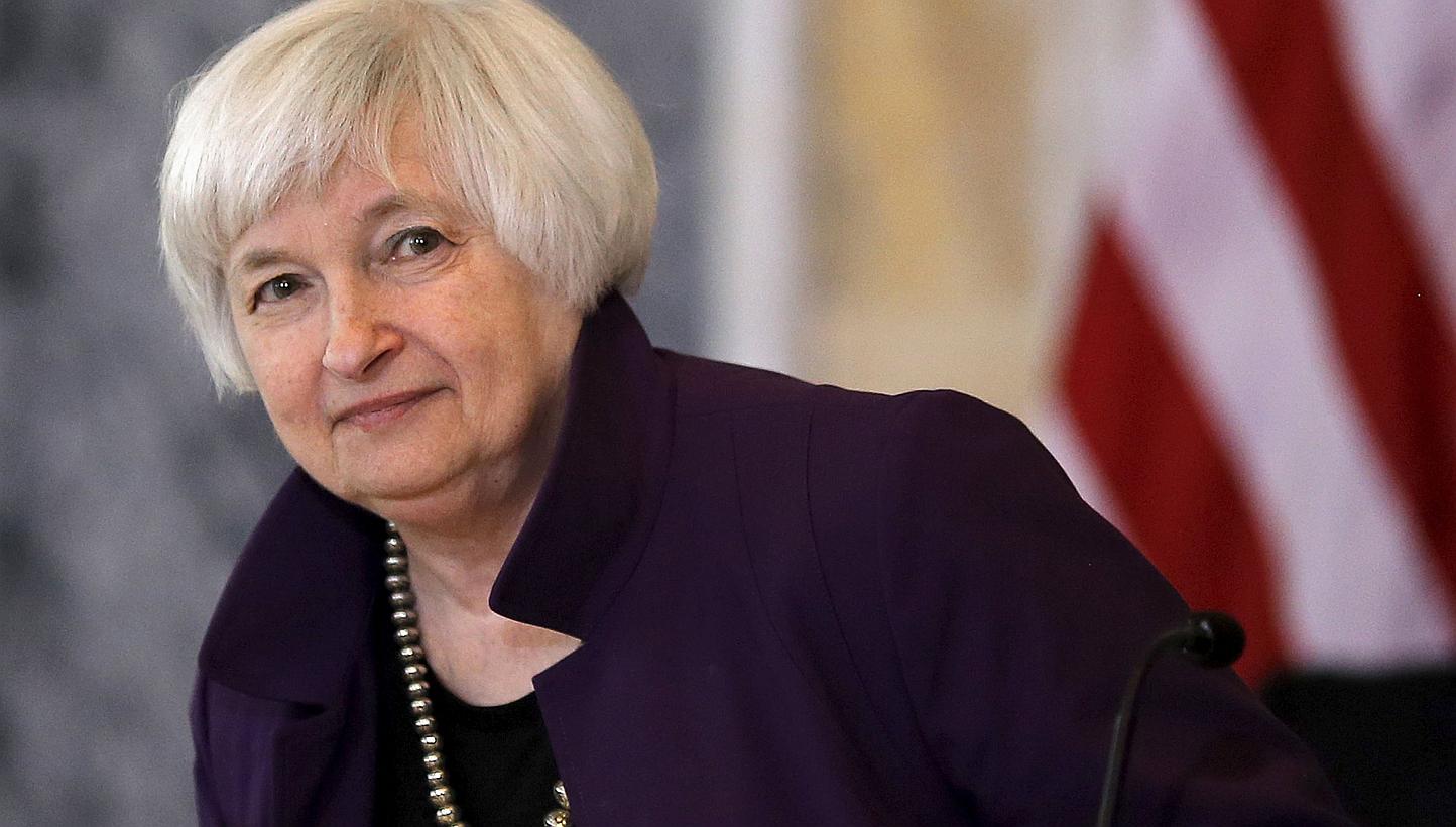 Janet Yellen (above) said Friday she expects the Federal Reserve to begin raising interest rates "at some point this year," saying delaying the long-awaited move risks the economy overheating. -- PHOTO: REUTERS