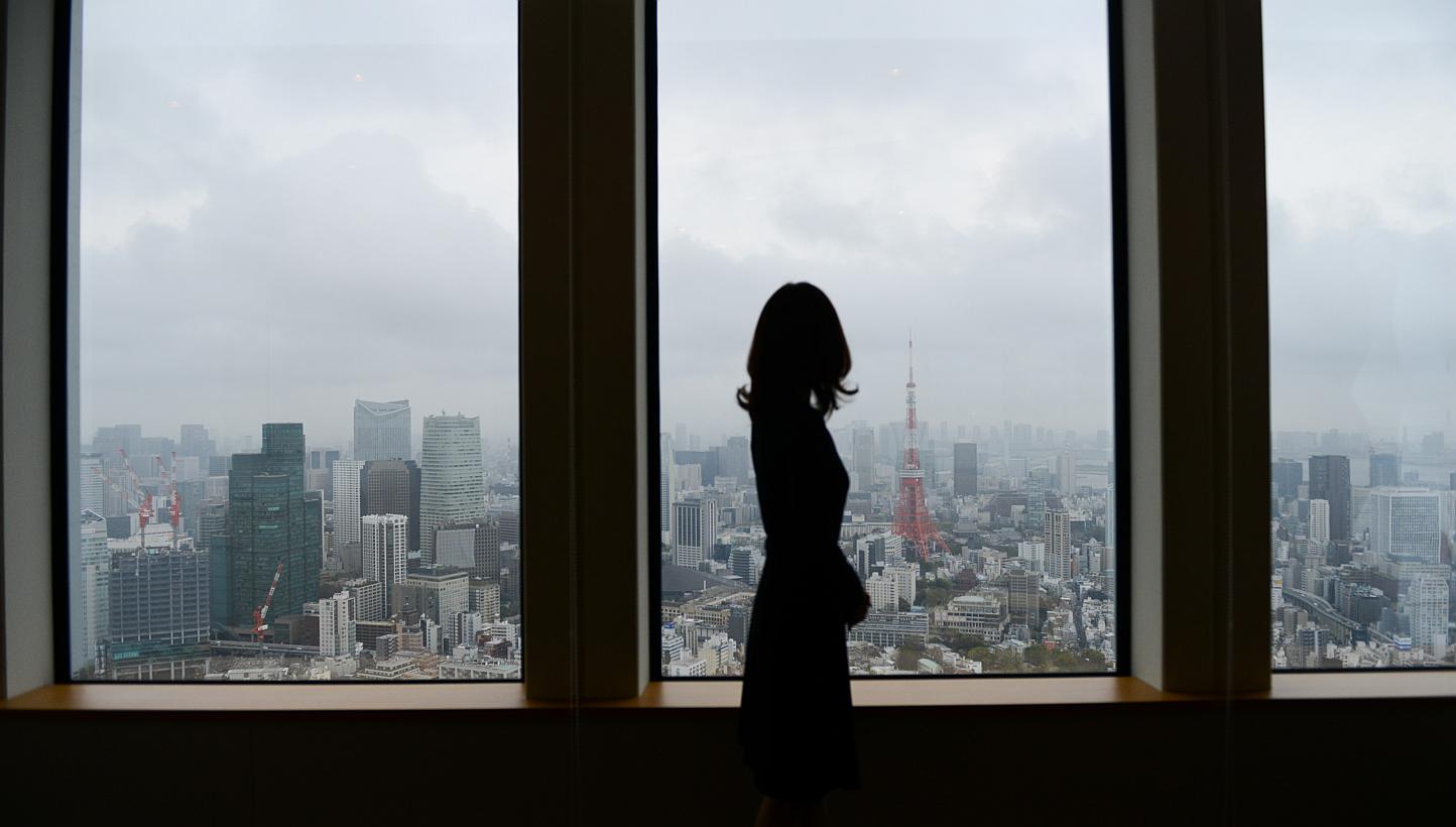 Japan's push to take away overtime from high-paid workers has critics warning that it will aggravate a problem synonymous with the country's notoriously long working hours - karoshi, or death from overwork. -- PHOTO: BLOOMBERG