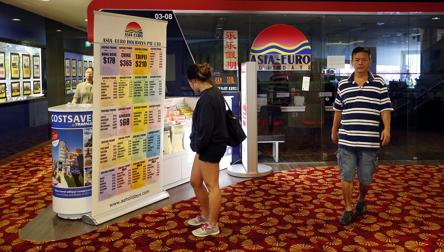 Asia-Euro Holidays staff were told to leave early last Friday. A note informing customers of the company's closure was then put up on the agency's door