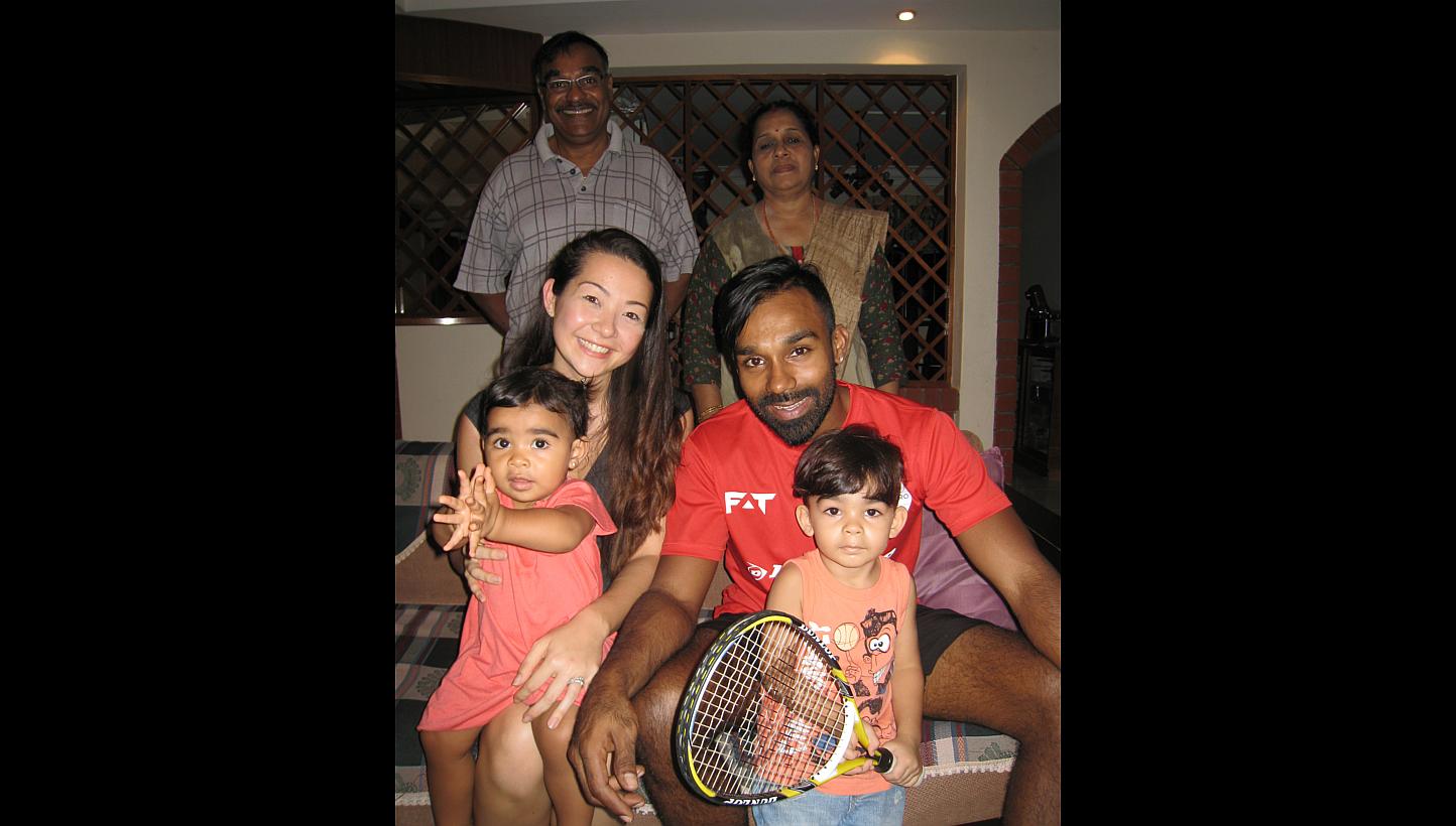 Singapore athlete Vivian Rhamanan (in red) with his wife, Ms Julia Shinozaki, and their children, Tia and Travis. Standing behind are his father, Mr Rhamanan Govindan Kochuvathi, and mother, Mrs Beena Rhamanan.