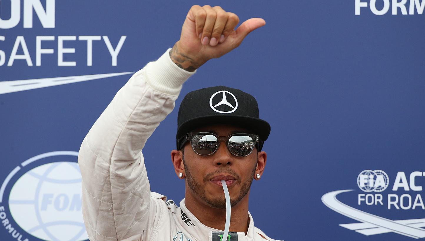 Defending world champion Lewis Hamilton is better for Formula One than either four-time title-holder Sebastian Vettel or Nico Rosberg, the sport's commercial supremo Bernie Ecclestone said on Sunday. -- PHOTO: REUTERS
