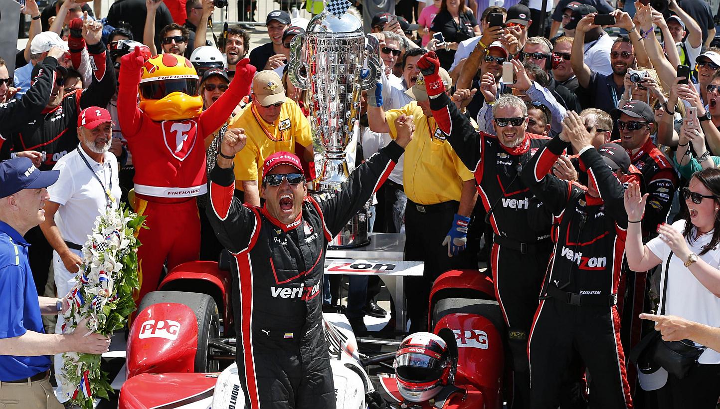 Juan Pablo Montoya of Colombia, driver of the #2 Team Penske Chevrolet Dallara celebrates after winning the 99th running of the Indianapolis 500 mile race at the Indianapolis Motor Speedway on May 24, 2015 in Indianapolis, Indiana. -- PHOTO: AFP