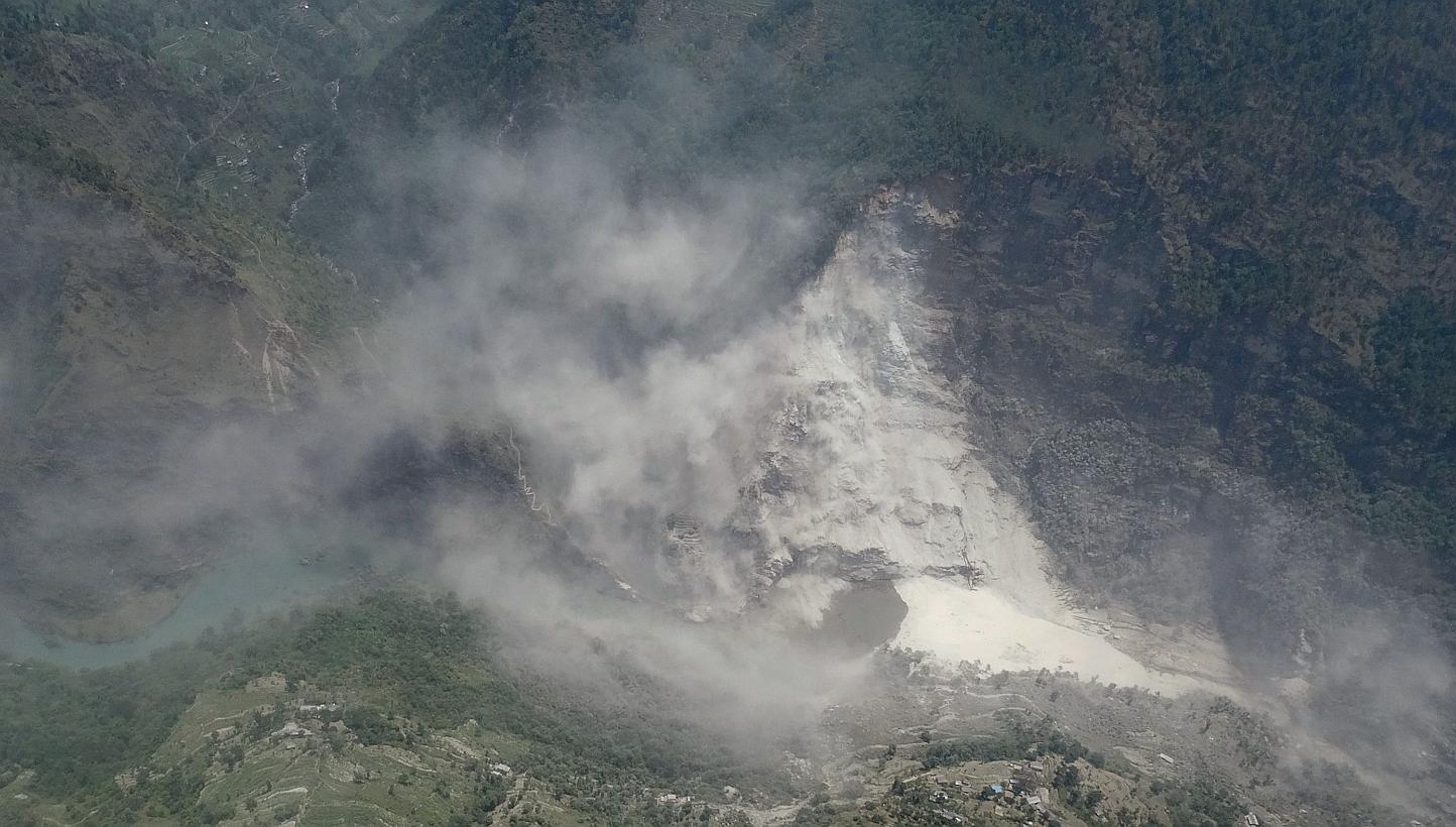 This handout photograph released by Nepal's Ministry of Home Affairs on May 24, 2015, shows an area in Nepal's Myagdi district affected by a landslide. Thousands of villagers have returned to their homes in quake-hit Nepal's mountainous north-west af
