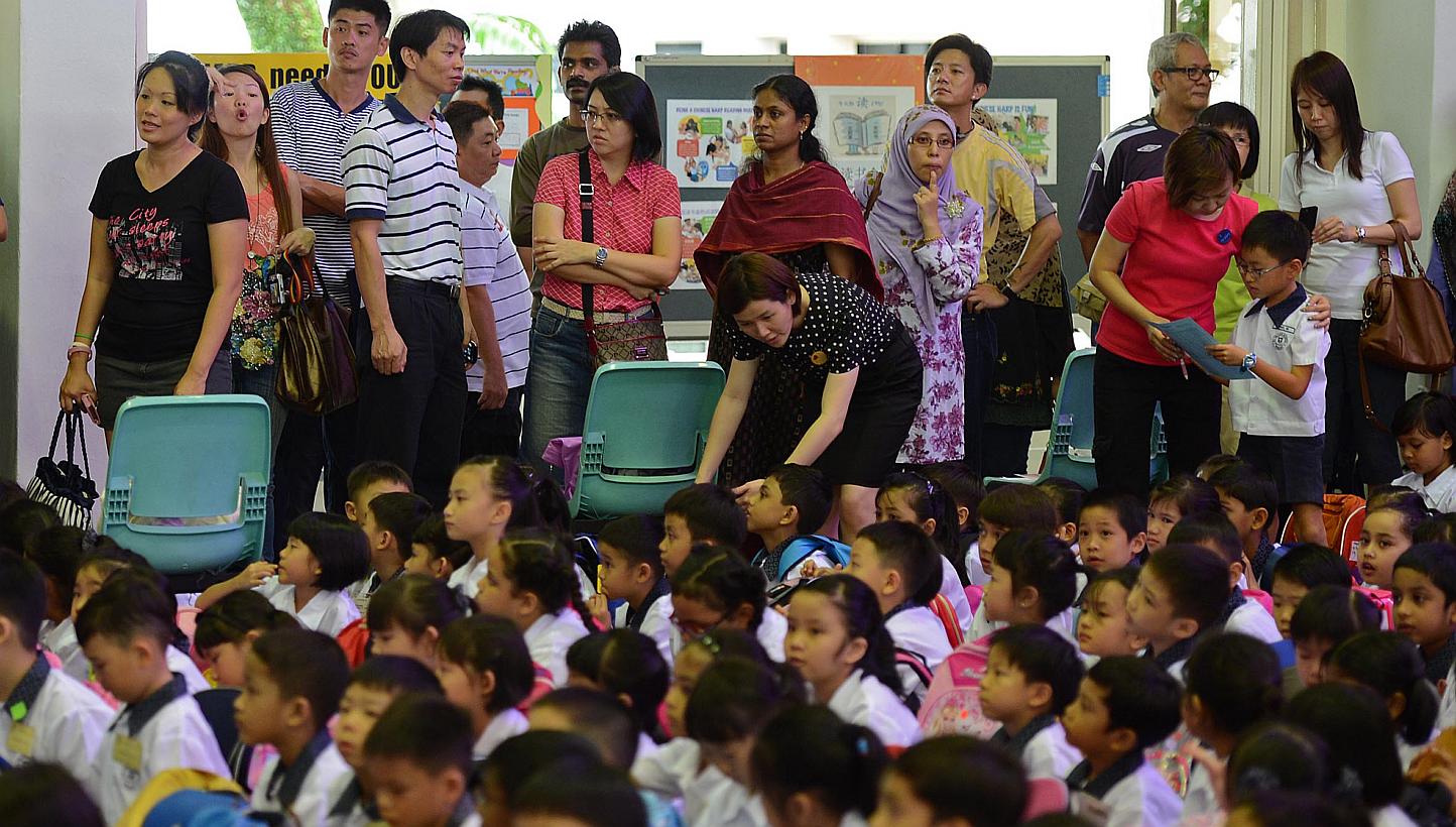 Children who have secured places in primary schools under the home-school distance priority will be required to stay at the address for at least 30 months from the start of the Primary 1 registration exercise on July 2, 2015. -- PHOTO: ST FILE