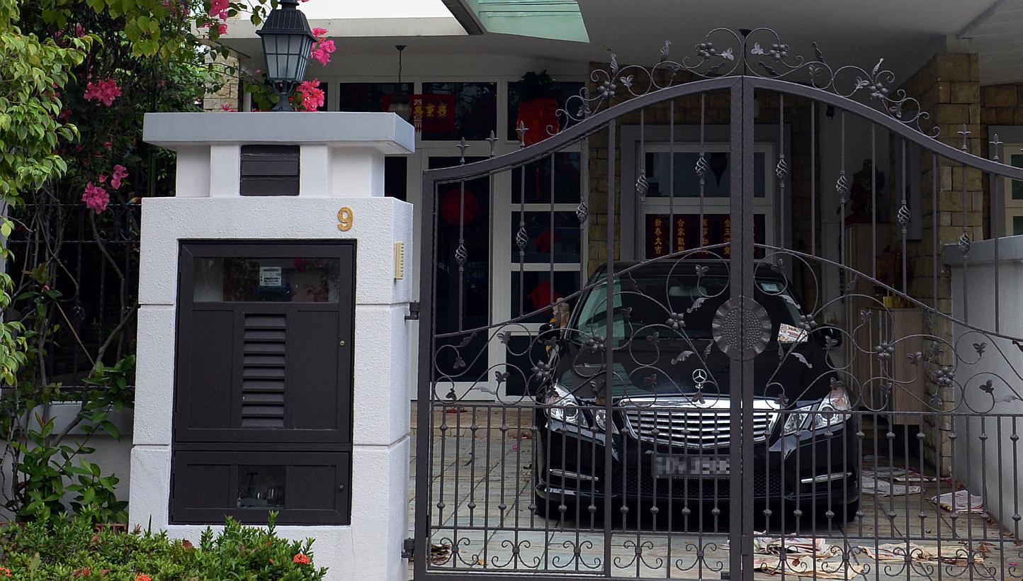 A Mercedes-Benz and a BMW were seen parked at the Tanah Merah semi-detached house of Madam Leong Lai Yee, but neighbours said they have not seen the family in two or three weeks.