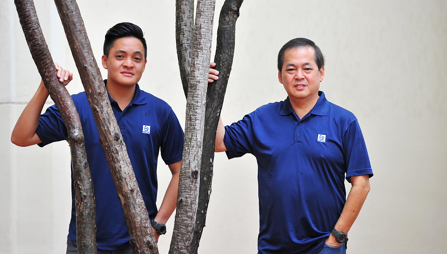 Inspect First (Singapore) director John Wee, and his son Shaun (far left), who is its business development executive. The company examines homes for flaws and whether they meet building and construction standards.
