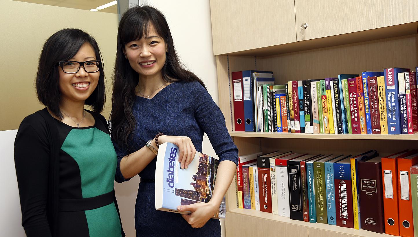 A team of experts, led by Associate Professor Joyce Lee (right) and graduate student Ms Melanie Siaw, has found that fasting during Ramadan can help to improve blood sugar levels for those with type 2 diabetes. -- ST PHOTO: CHEW SENG KIM