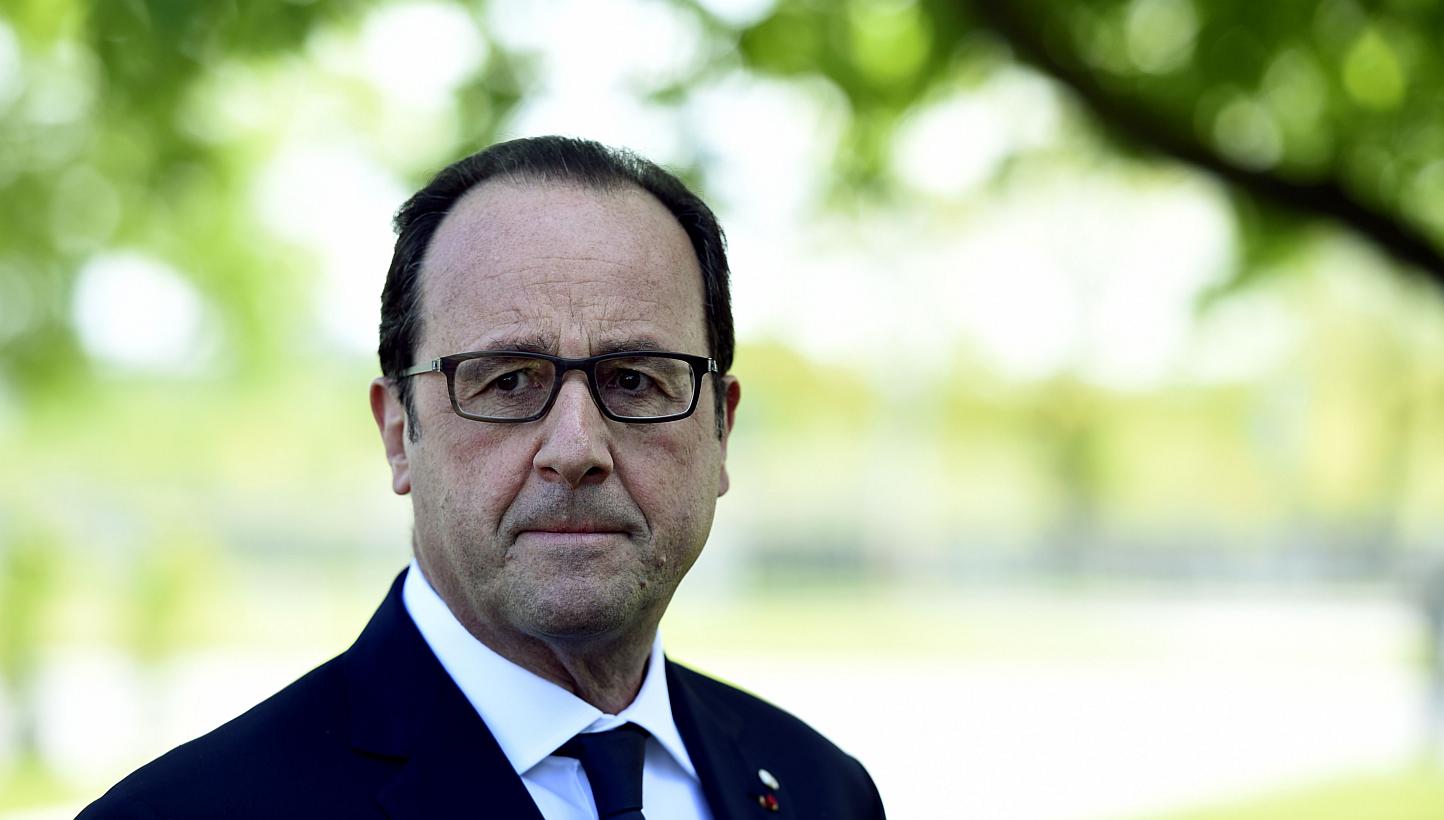 French President Francois Hollande is pictured during a press conference, on the second day of the fourth European Union (EU) eastern Partnership Summit in Riga, on May 22, 2015. New questions surfaced about his personal security on Tuesday as Le Mon