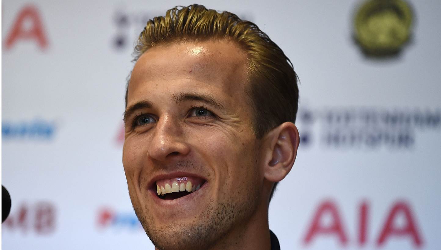 Tottenham striker Harry Kane on Tuesday dismissed speculation of a move to Manchester United following his breakout season, as Spurs readied for a friendly in Kuala Lumpur against a Malaysian select squad. -- PHOTO: AFP