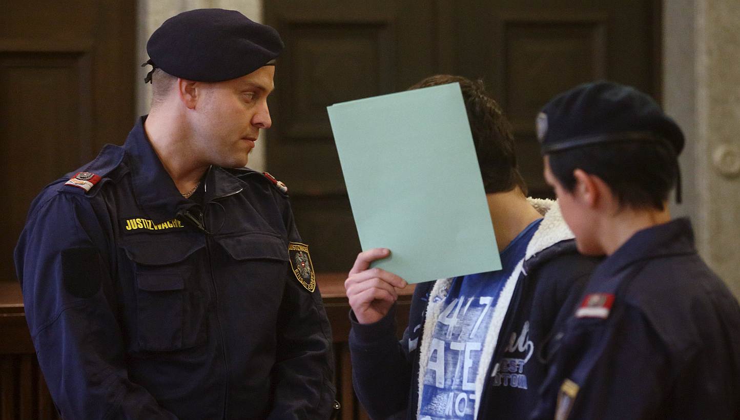 A 14-year-old terror suspect, accused of preparing to join militant fighters in Syria and researching how to build a bomb, waits for the start of his trial in St Poelten, Austria, May 26, 2015. -- PHOTO: REUTERS&nbsp;