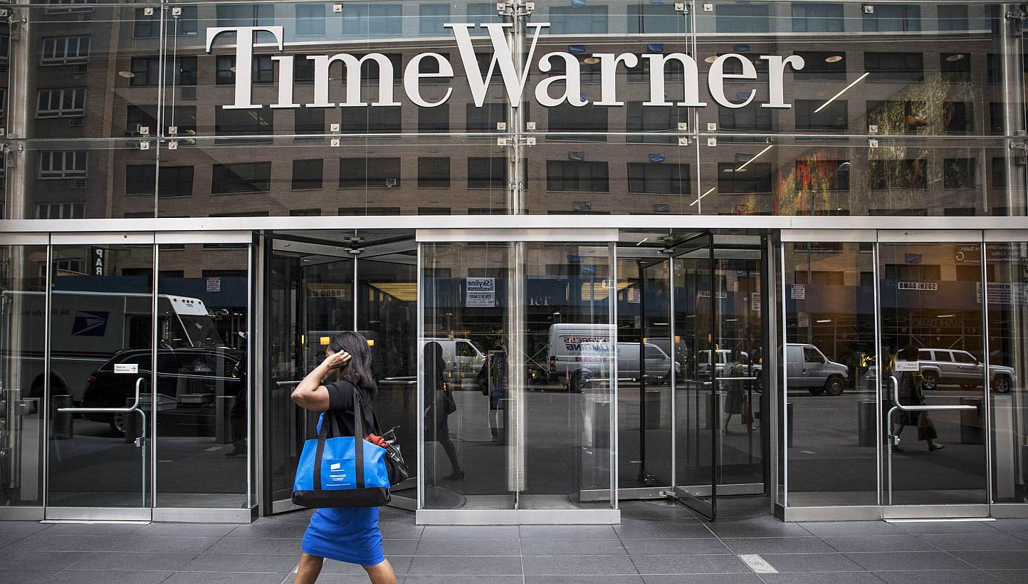 John Malone's Charter Communications struck a US$56 billion (S$75.1 billion) deal to buy Time Warner Cable, seeking to combine the third and second largest US cable operators to better compete against market leader Comcast. -- PHOTO: AFP