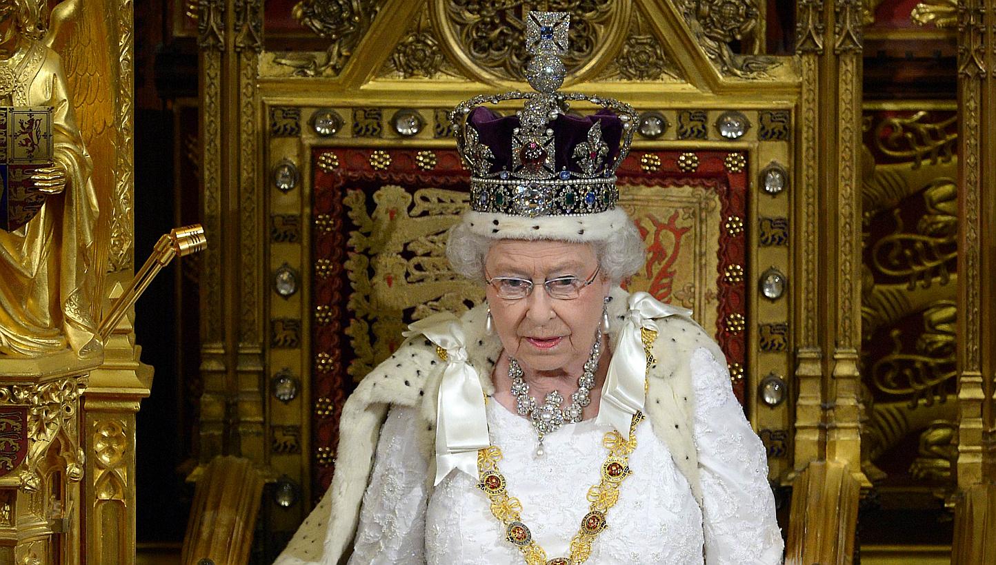 In this file photograph taken on June 4, 2014, Britain's Queen Elizabeth delivers the Queen's Speech from the Throne in the House of Lords during the State Opening of Parliament at the Palace of Westminster in London. -- PHOTO: AFP