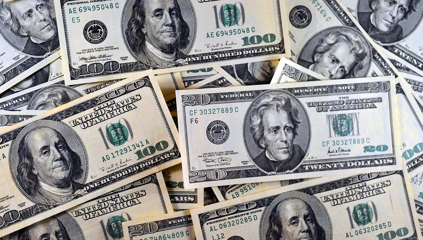 The US dollar jumped to an almost eight-year high against the yen as economic reports suggested the US is getting back on track after a slow first quarter. -- PHOTO: AFP