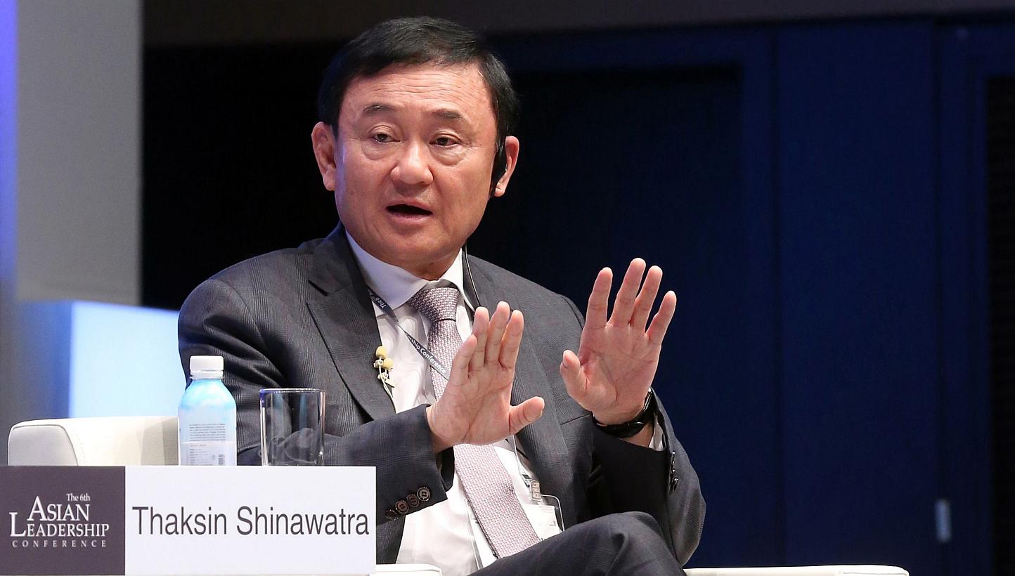 Former premier Thaksin Shinawatra speaking at the Asian Leadership Conference in Seoul on May 19, 2015. Thailand's foreign ministry on Wednesday, May 27, said it had cancelled the fugitive former premier's passports because he was deemed to have "end