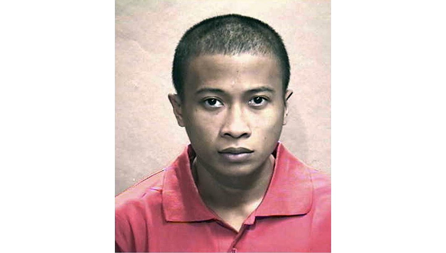 Storeman Haliffie Mamat, who raped a woman in his car on a bridge in Kallang Bahru and robbed her of her handbag, was on Wednesday sentenced to 13 years' jail and 18 strokes of the cane. -- PHOTO: SINGAPORE POLICE FORCE&nbsp;