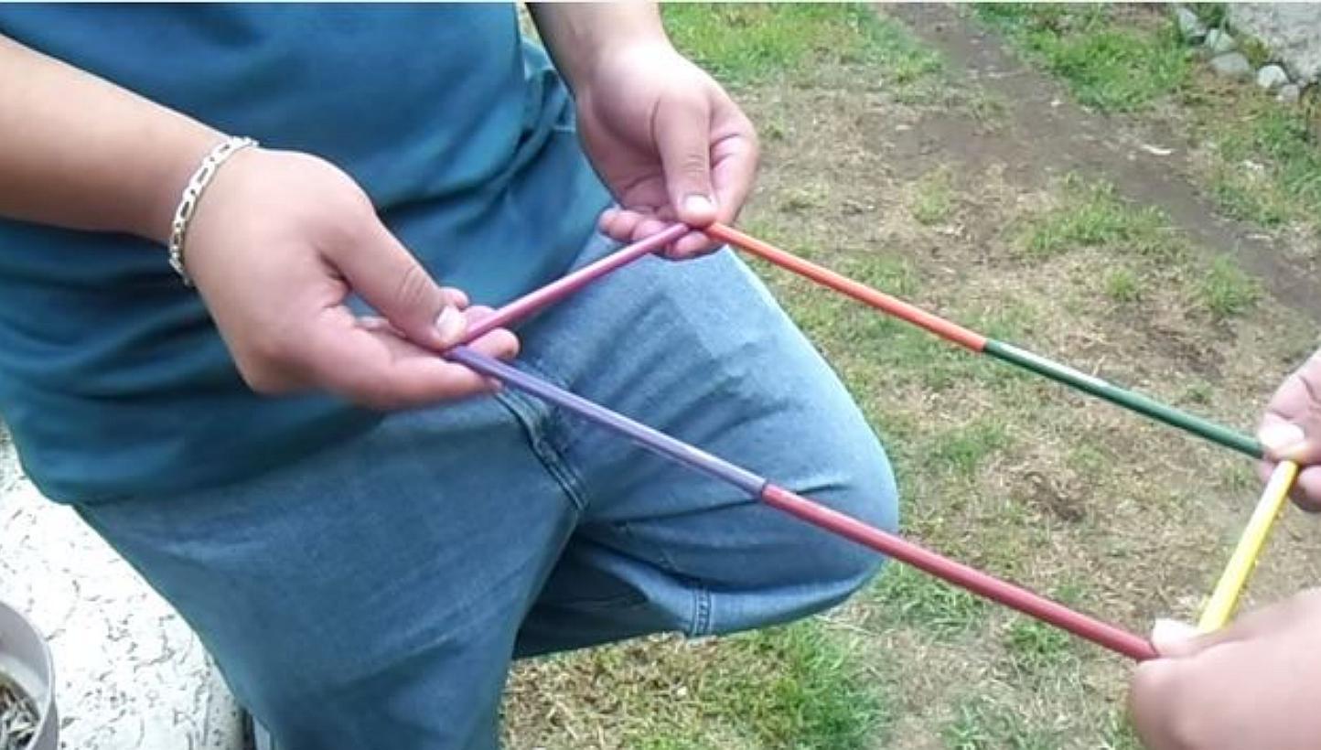 It is not clear how the 'Charlie Charlie Challenge' took the Internet world by storm, but a YouTube video on June 6, 2014, shows two teens playing the game. -- PHOTO: YOUTUBE SCREENGRAB