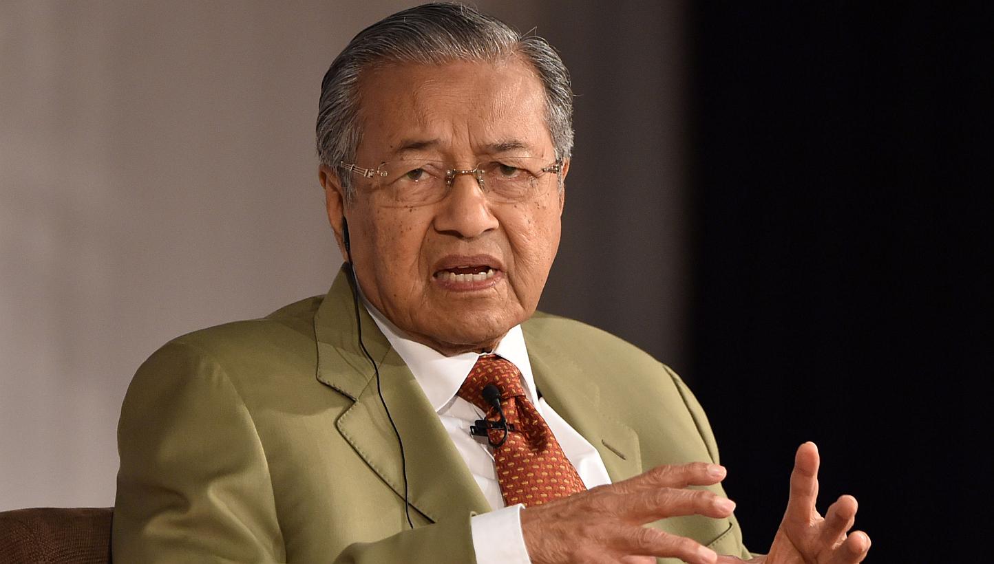 Former prime minister Dr Mahathir Mohamad has questioned whether 1Malaysia Development Berhad (1MDB) was involved in money laundering. -- PHOTO: AFP