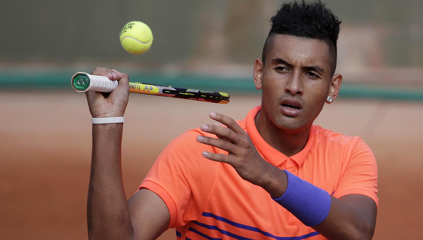 Australia's Nick Kyrgios reacting during his match against Uzbekistan's Denis Istomin during the men's first round of the Roland Garros 2015 French Tennis Open in Paris on May 25, 2015. -- PHOTO: AFP