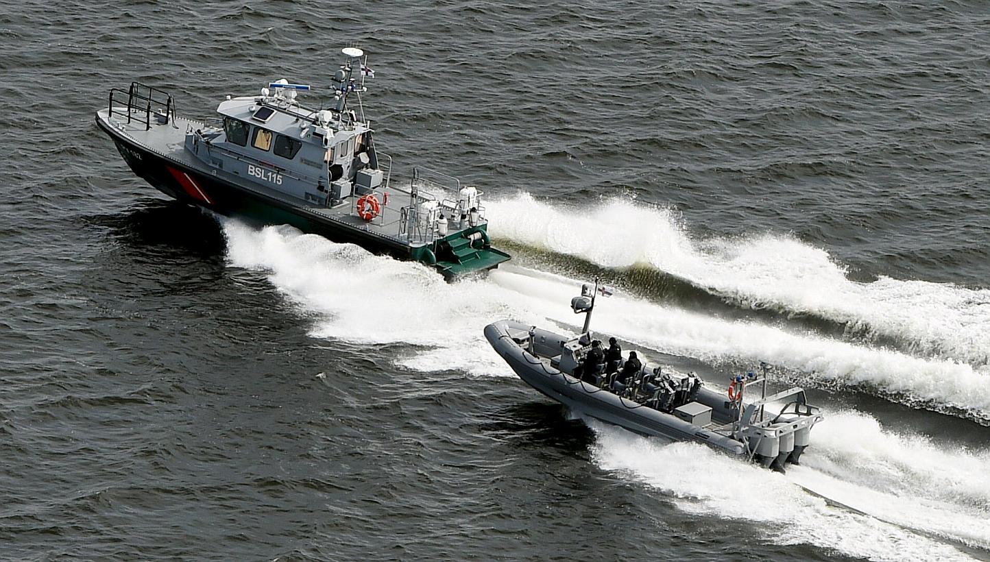 Finnish Border Guard boats patrol the waters near Helsinki on April 28, 2015.&nbsp;The Finnish Border Guard said on Thursday, May 28, that it had not been able to confirm the presence of a suspected submarine near Helsinki last month. -- PHOTO: REUTE