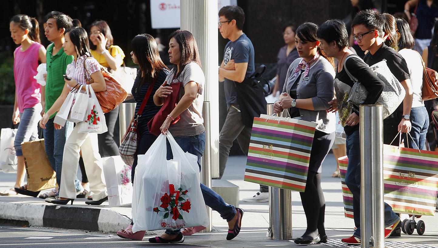 The Sale will also extend beyond brick-and-mortar shops. Shoppers who pay using MasterCard can get discounts on websites such as Expedia, Qoo10, Rakuten and Zalora. -- PHOTO: ST FILE