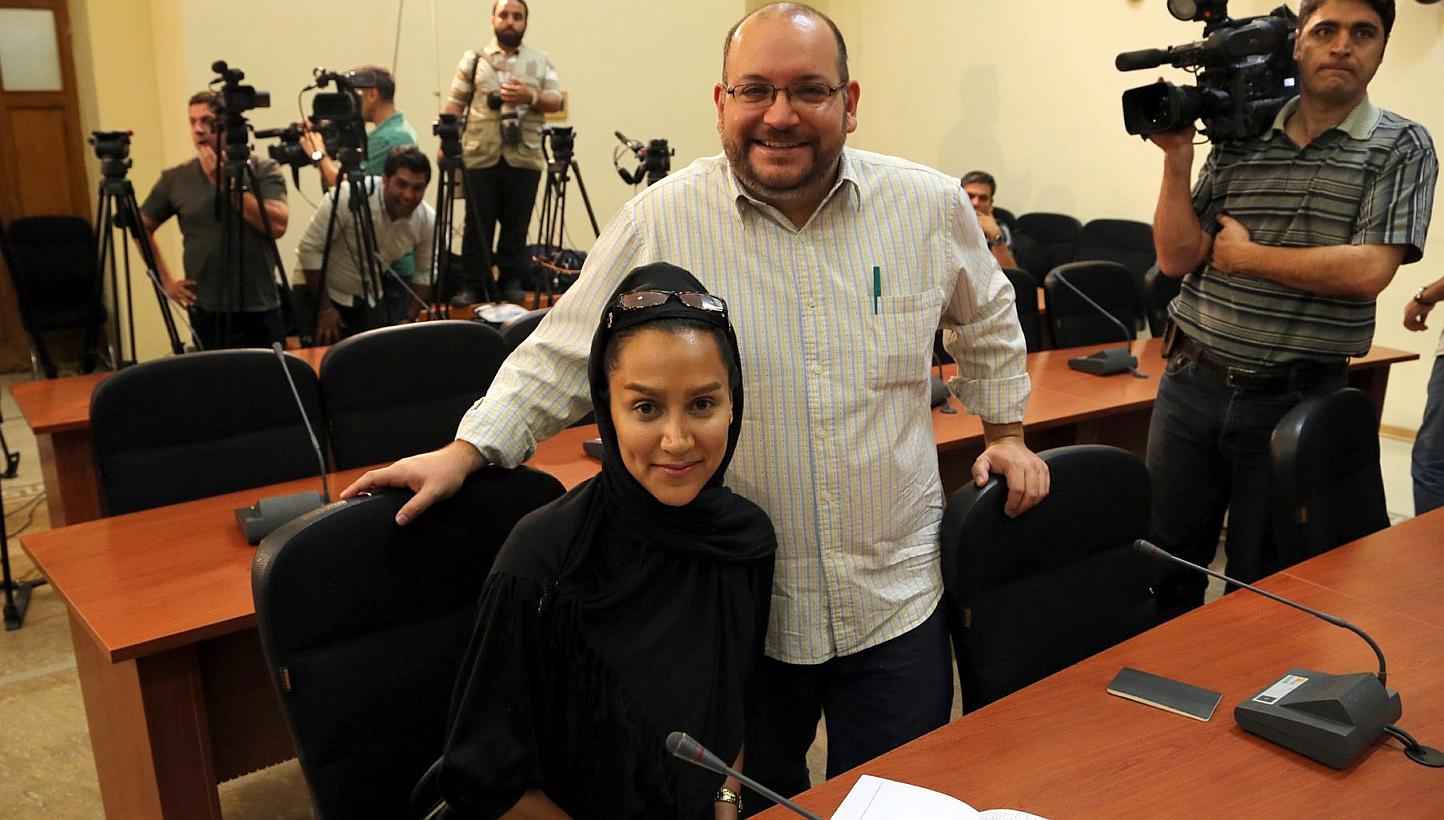 A file picture dated Sept 10, 2013, shows Washington Post Iranian-American journalist Jason Rezaian and his Iranian wife Yeganeh Salehi during a press conference in Teheran, Iran. -- PHOTO: EPA
