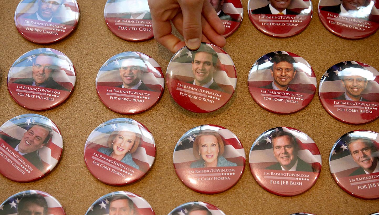 Campaign buttons featuring Republican presidential hopefuls are seen on display during the 2015 Southern Republican Leadership Conference on May 21, 2015 in Oklahoma City, Oklahoma. -- PHOTO: AFP