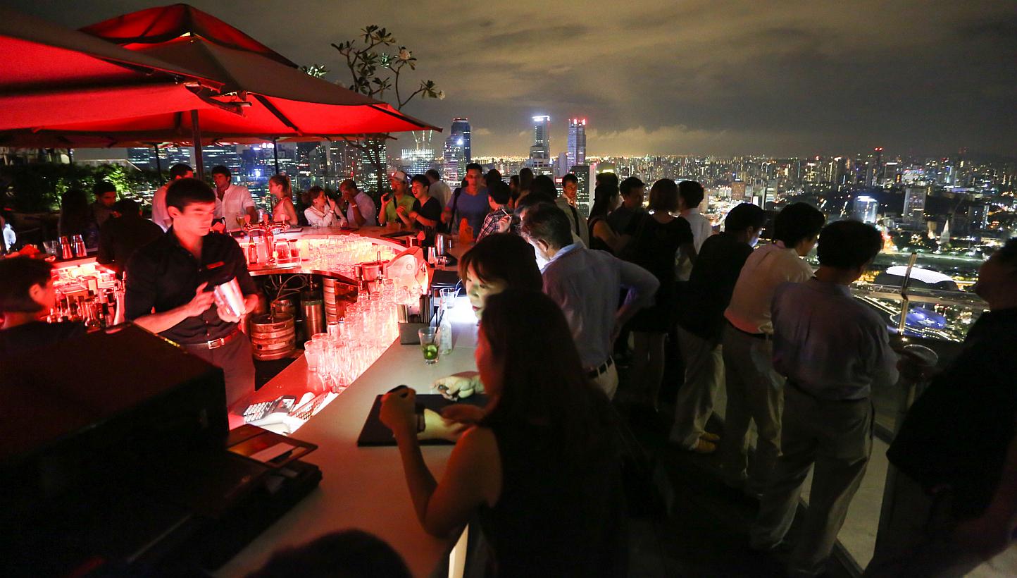One of the biggest nightclub draws here, the 57th-floor bar on top of MBS has two weeks to undertake to the Court of Appeal that it will stop using the name. If not, the court will issue an order to stop its use. -- PHOTO: ST FILE