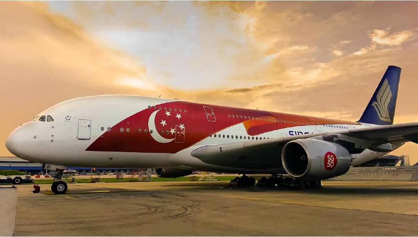 Singapore Airlines (SIA) is celebrating the nation's Golden Jubilee by having two Airbus 380s in a special livery, featuring a large Singapore flag-themed design on the fuselage. -- PHOTO: SINGAPORE AIRLINES