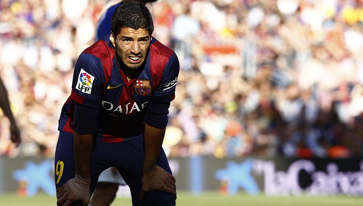 Luis Suarez reacts during the Spanish league football match FC Barcelona v Real Sociedad de Futbol on May 9, 2015. -- PHOTO: AFP&nbsp;