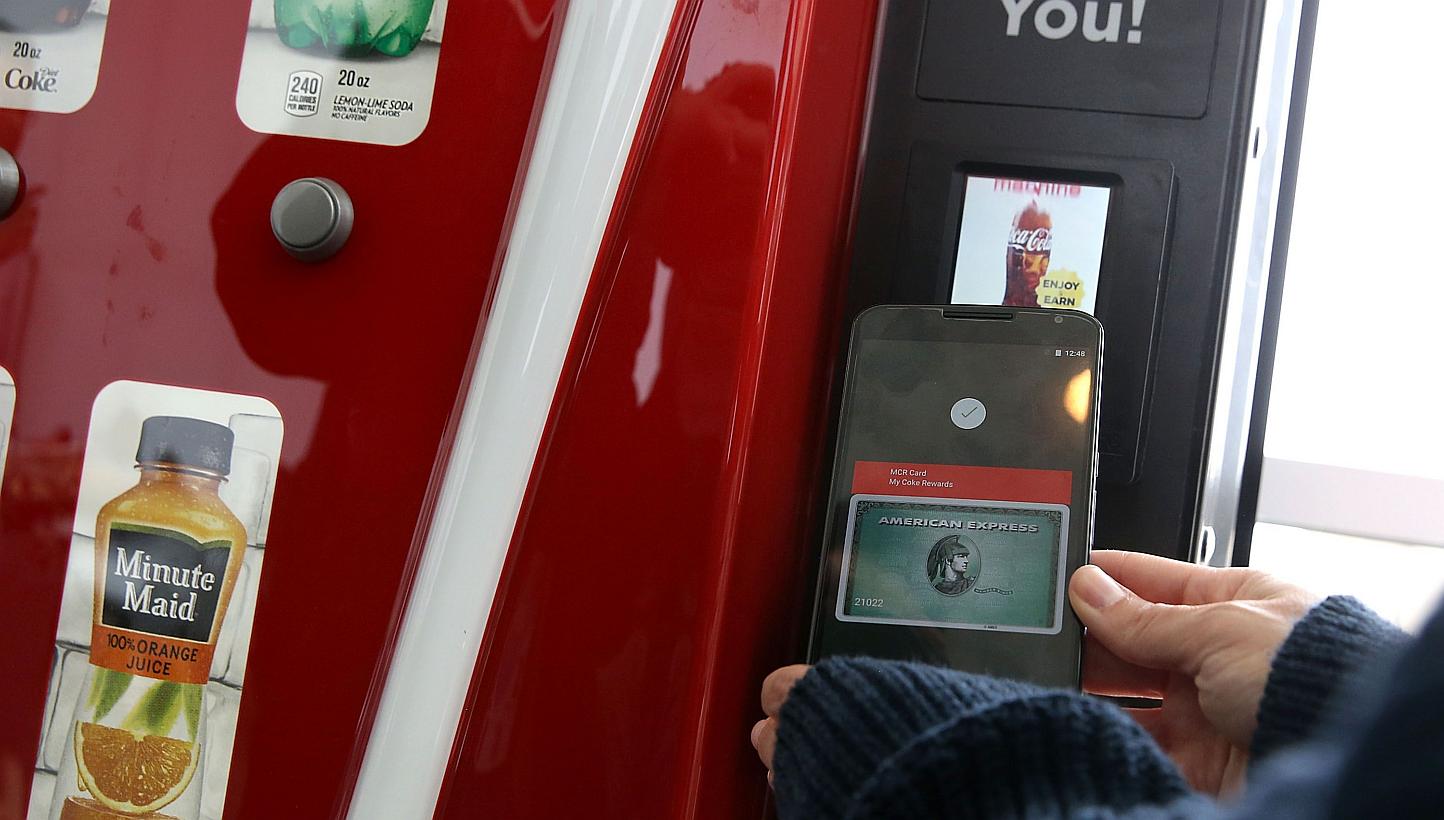 Google on Thursday unveiled its pay-with-a-phone system for Android devices, ramping up its challenge to Apple in mobile payments. -- PHOTO: AFP