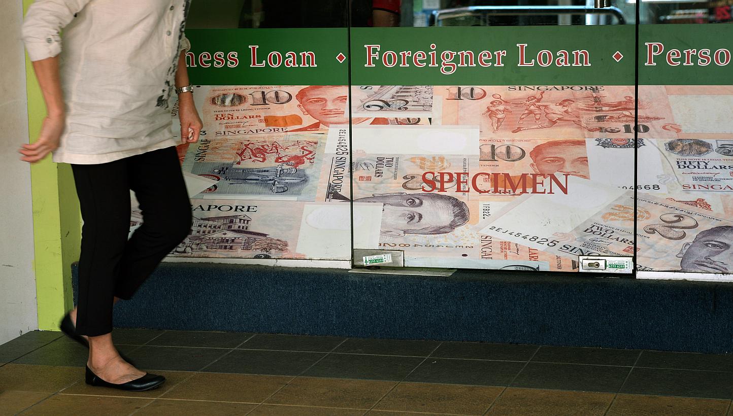 An advisory committee on Friday proposed an interest rate cap of 4 per cent a month and a late-payment interest capped at 4 per cent a month, that licensed moneylenders are allowed to charge borrowers. -- PHOTO: ST FILE&nbsp;