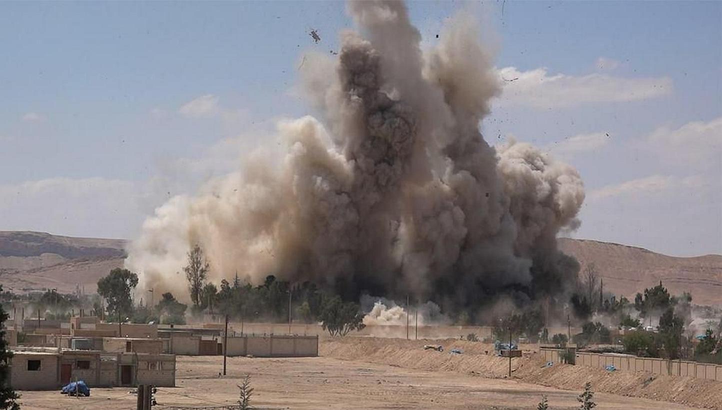 An image made available by Jihadist media outlet Welayat Homs on May 30, 2015, allegedly shows the prison of the Syrian city of Palmyra being blown up by Islamic State group jihadists, 10 days after they seized the ancient city from pro-regime forces