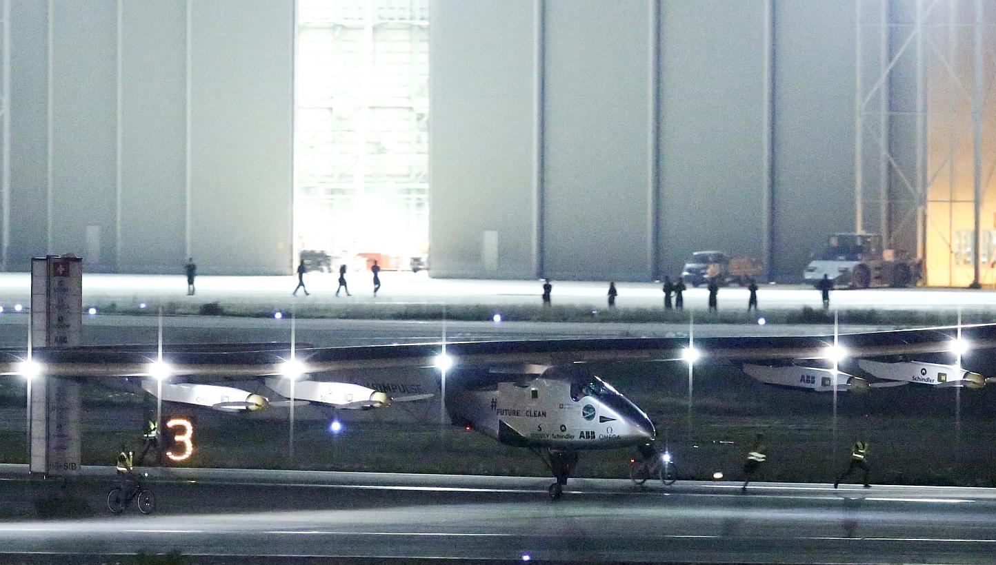 The Solar Impulse 2 touches down at Nagoya airport in Japan on MOnday night (June 1). -- PHOTO: REUTERS