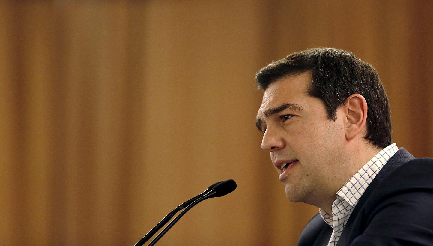 Greece's PM Alexis Tsipras attacked the country's creditors for insisting on what he described as "absurd" reforms which have only held up progress in negotiations for a deal aimed at preventing his country from defaulting. -- PHOTO: AFP
