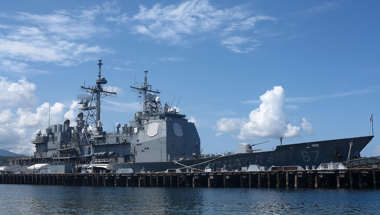 A US warship anchored last Thursday at Subic Bay in the Philippines as part of a military patrol in the South China Sea. The US-China status quo may not be sustainable and could transition to a crisis. A compromise could avoid such a scenario and sho