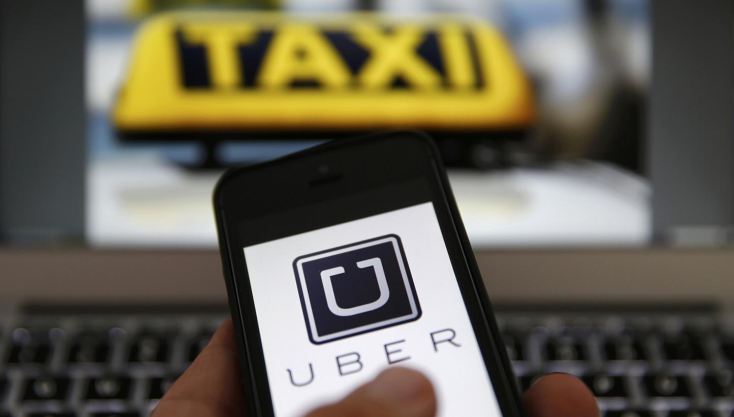An Indian woman has accused a driver contracted with online taxi company Uber of trying to sexually harass her after she hailed his cab on Saturday on May 30, 2015. -- PHOTO: REUTERS