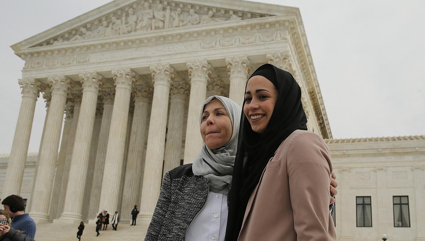 Muslim woman Samantha Elauf (right), who was denied a sales job at an Abercrombie Kids store in Tulsa in 2008, stands with her mother Majda outside the US Supreme Court in Washington, in this February 25 file photo. -- PHOTO: REUTERS