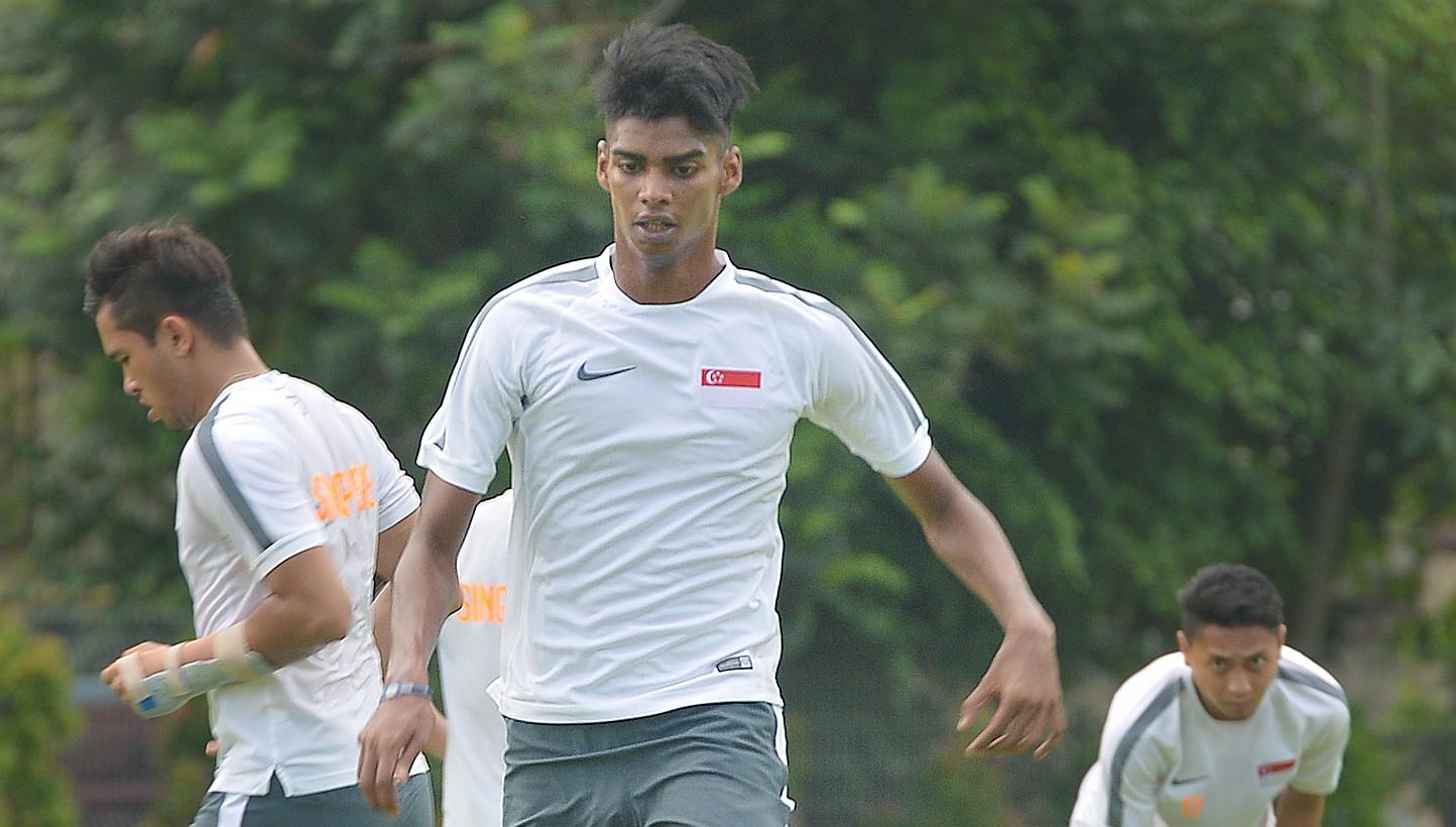 Lions coach Bernd Stange has called up striker Iqbal Hussain (centre) for the World Cup qualifier against Japan, in a move that came just days after he was dropped by Aide Iskander from the SEA Games squad. -- ST PHOTO: ALPHONSUS CHERN