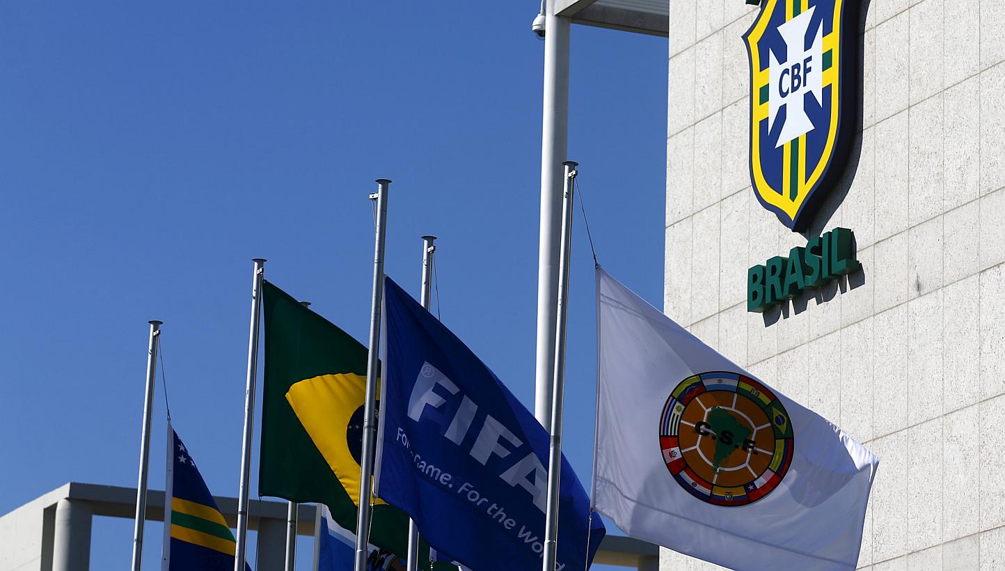 A Fifa flag flying outside the Brazilian Football Confederation headquarters in Rio de Janeiro last week. The confederation removed the name of Jose Maria Marin from the facade of its headquarters one day after its former president was arrested in a 