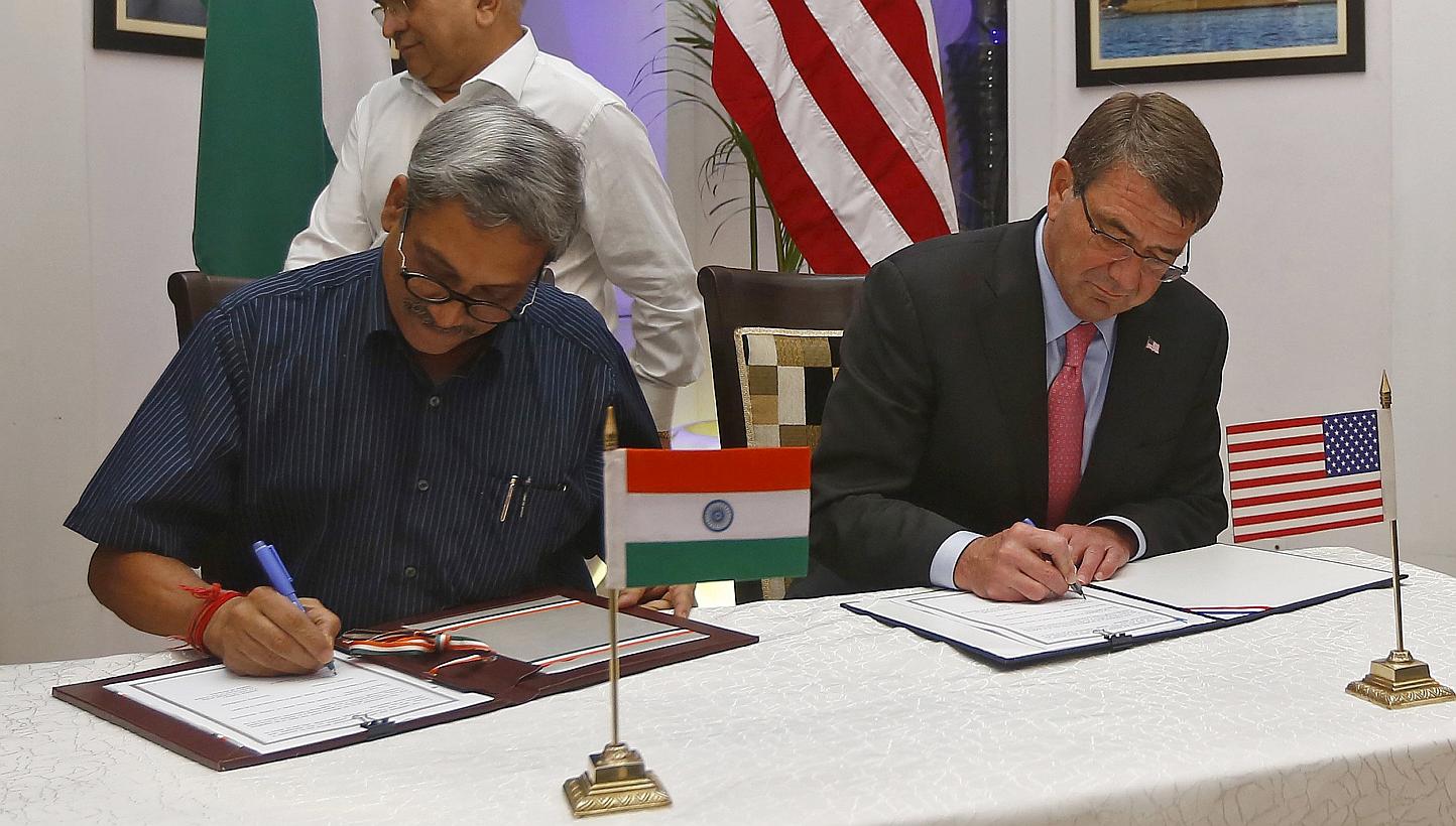 US Defence Secretary Ashton Carter (right) and India's Defence Minister Manohar Parrikar at the signing of agreements ceremony in New Delhi, India, on June 3, 2015. -- PHOTO: REUTERS
