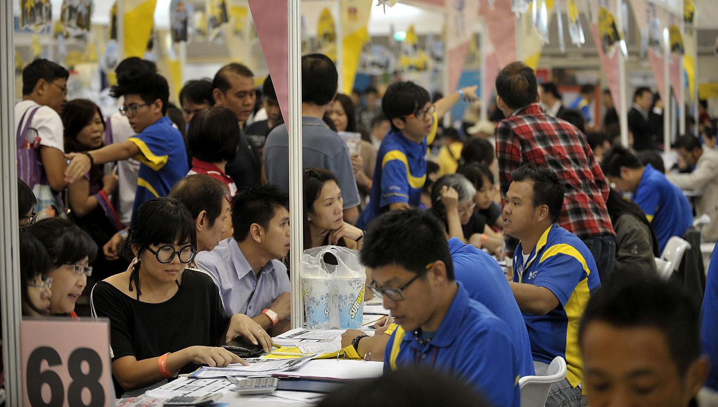 Visitors at the Chan Brothers booth at the Natas 2012 travel fair held at the Singapore Expo. -- PHOTO: ST FILE
