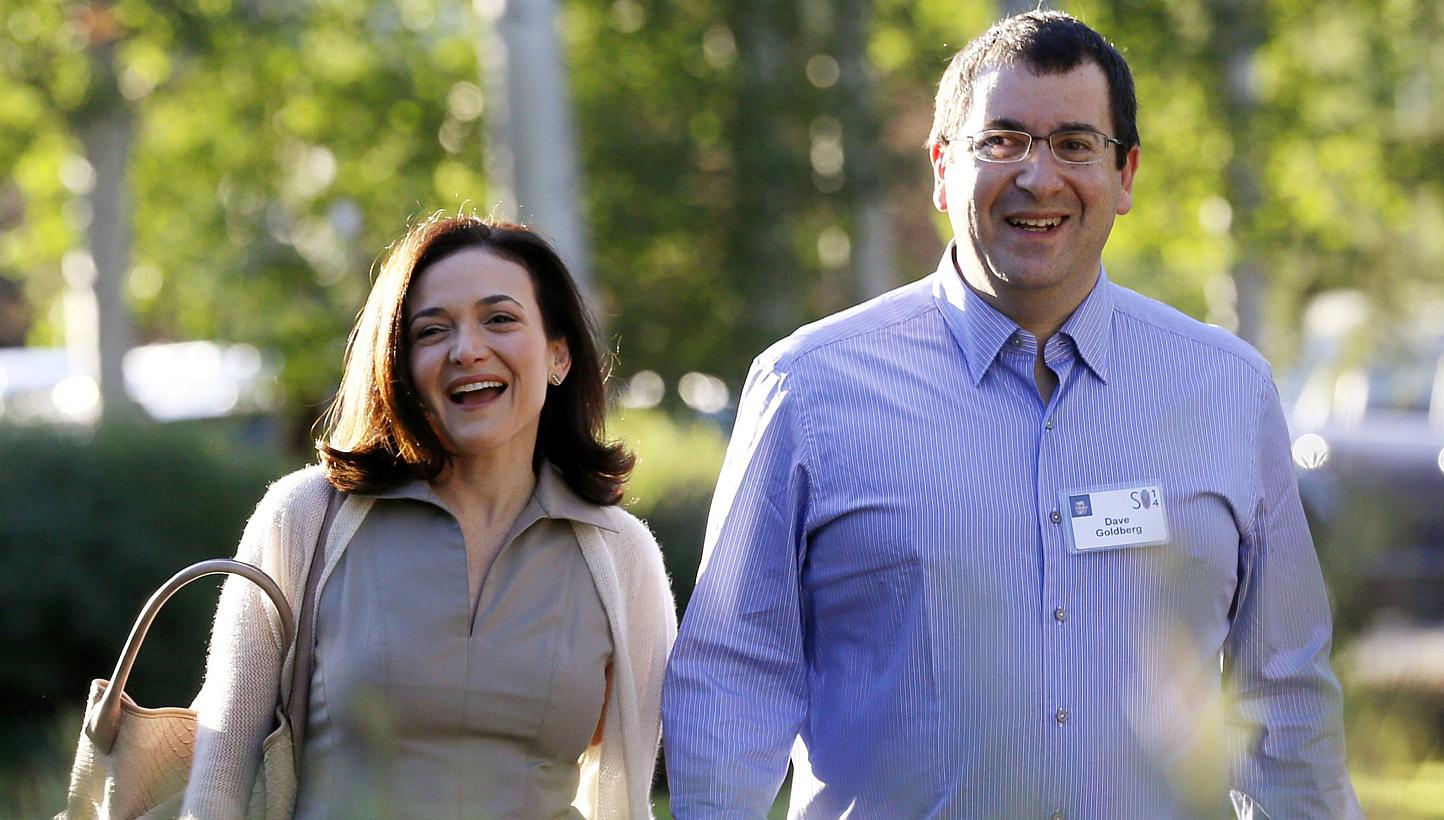 Sheryl Sandberg, Chief Operating Officer (COO) of Facebook, with her husband David Goldberg, CEO of SurveyMonkey. -- PHOTO: REUTERS&nbsp;