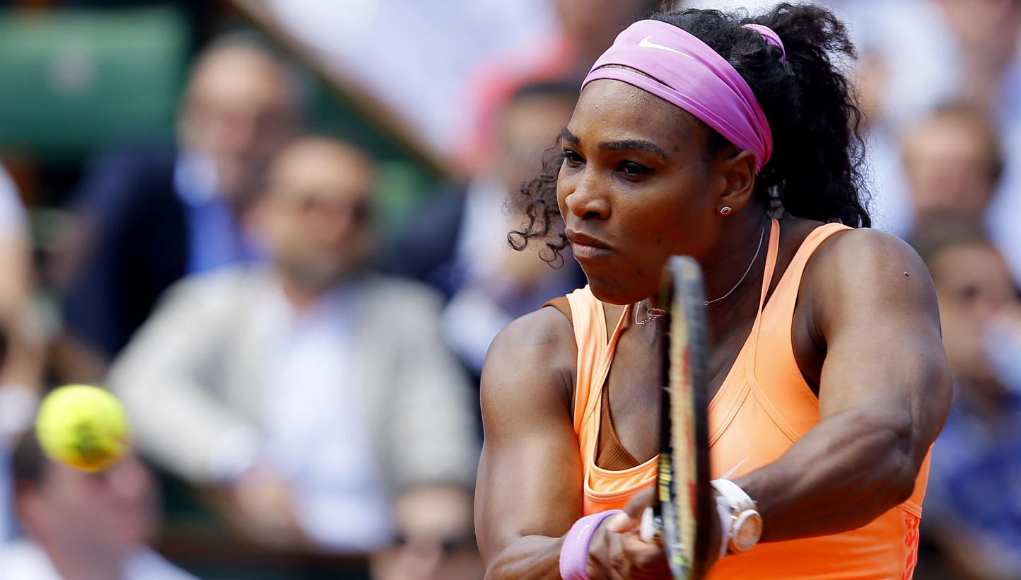 Serena Williams of the USA in action against.Sara Errani of Italy during their quarterfinal match for the French Open tennis tournament at Roland Garros in Paris, France on June 3, 2015. -- PHOTO: EPA