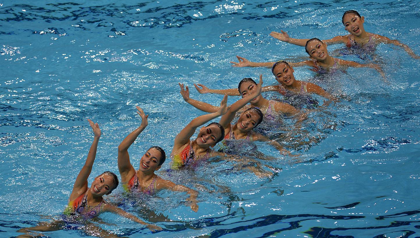 The Malaysian synchronised swimming team competing in the Team Free routine on June 3, 2015. -- ST PHOTO: CAROLINE CHIA&nbsp;