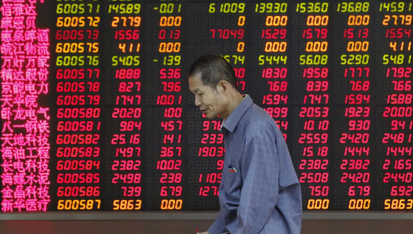 The Shanghai Composite Index climbed above 5,000 points for the first time in seven years, the latest milestone in a world-beating rally. -- PHOTO: EPA
