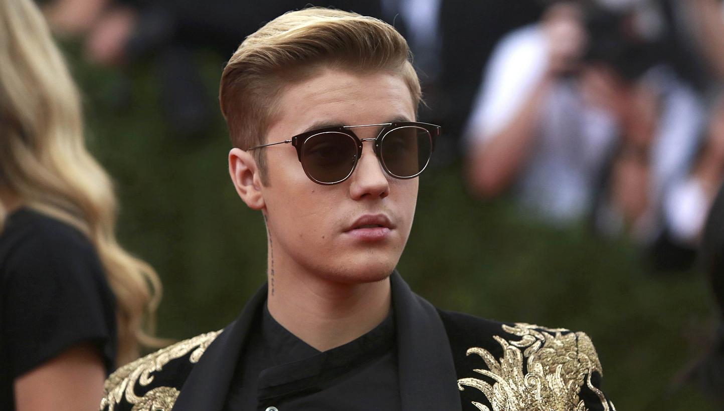 Justin Bieber at the Metropolitan Museum of Art Costume Institute Gala 2015. Bieber has pleaded guilty to assault and careless driving charges in connection with a collision near his Ontario hometown, Canadian media reported on Thursday. -- PHOTO: RE