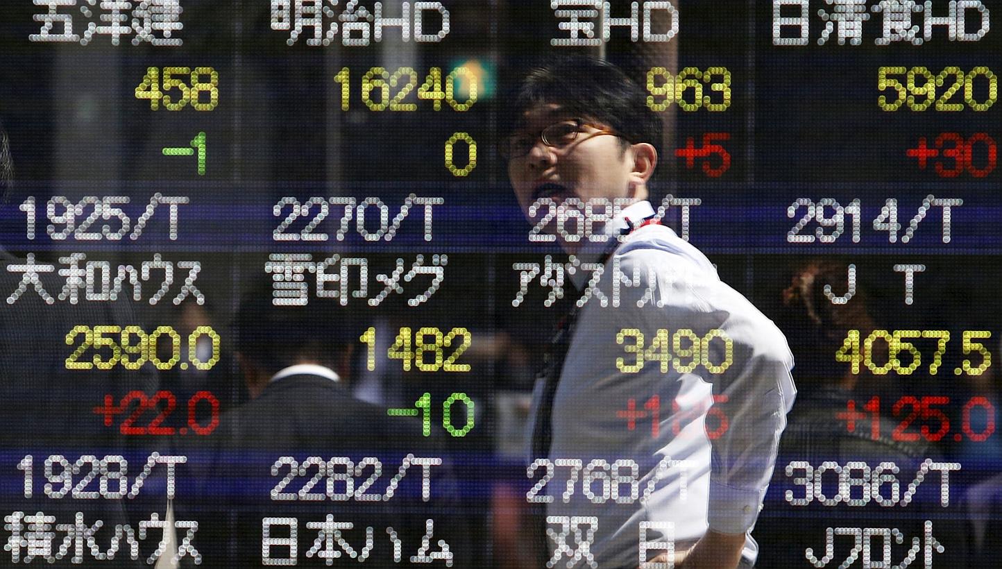 Asian stocks fell for a fifth day, with the regional benchmark index heading for its second week of losses, following a decline in United States equities as Greece asked for a deferral on its debt payments. -- PHOTO: REUTERS