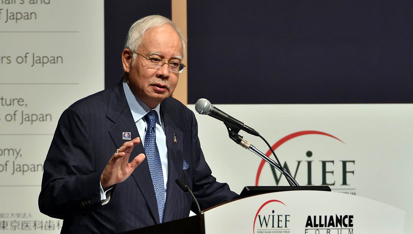 Malaysian Prime Minister Najib Razak delivers an opening speech for the round table meeting of the World Islamic Economic Forum (WIEF) Foundation and Alliance Forum Foundation (AFF) in Tokyo on May 26, 2015. -- PHOTO: AFP